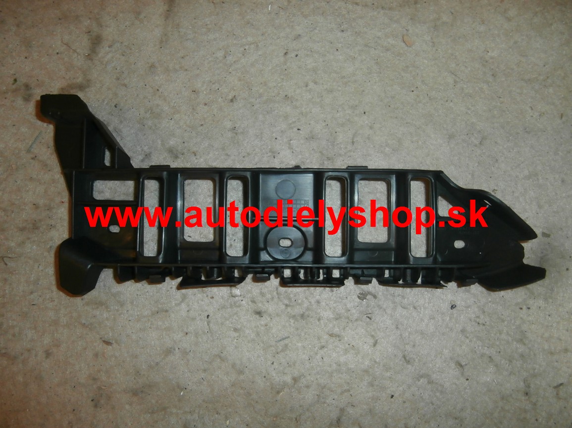 VW TOURAN 12/06-2010 držiak predného nárazníku Pravý