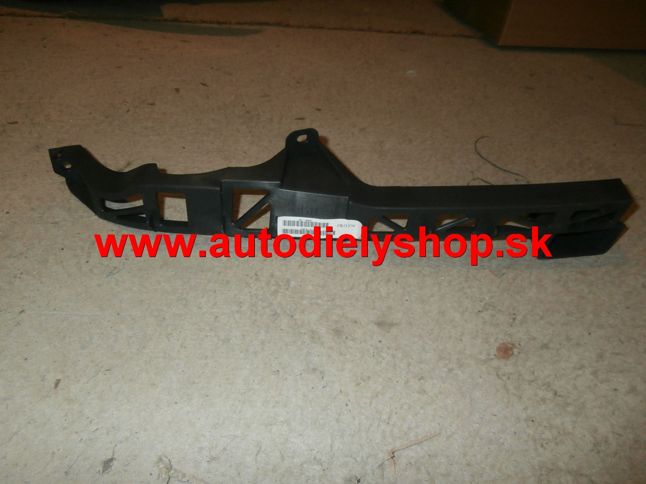 Mazda 3 10/03- 6/09 držiak predného nárazníka ľavý na sedan