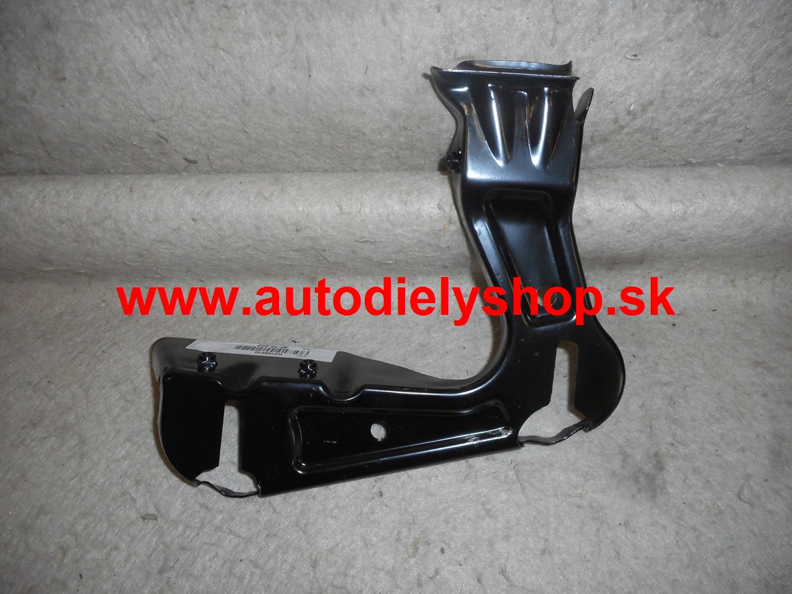 Škoda Octavia II 7/04- uchytenie svetla dolné,Lavé