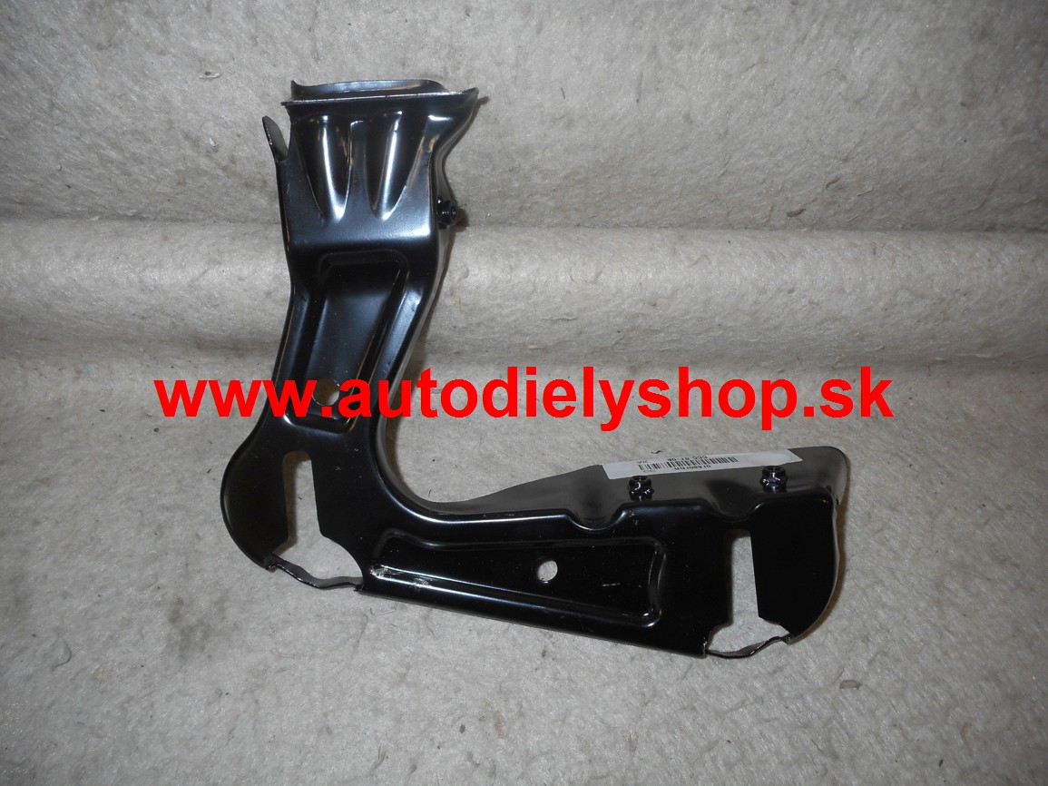 Škoda Octavia II 7/04- uchytenie svetla dolné,Pravé