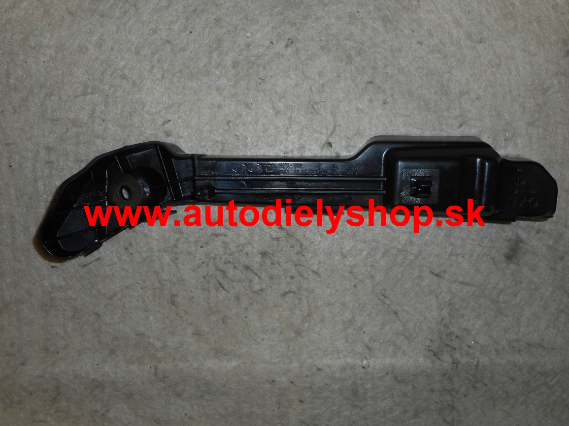 Kia CARENS 09/06- vonkajší držiak pred. nárazníku ľavý ORIGINAL