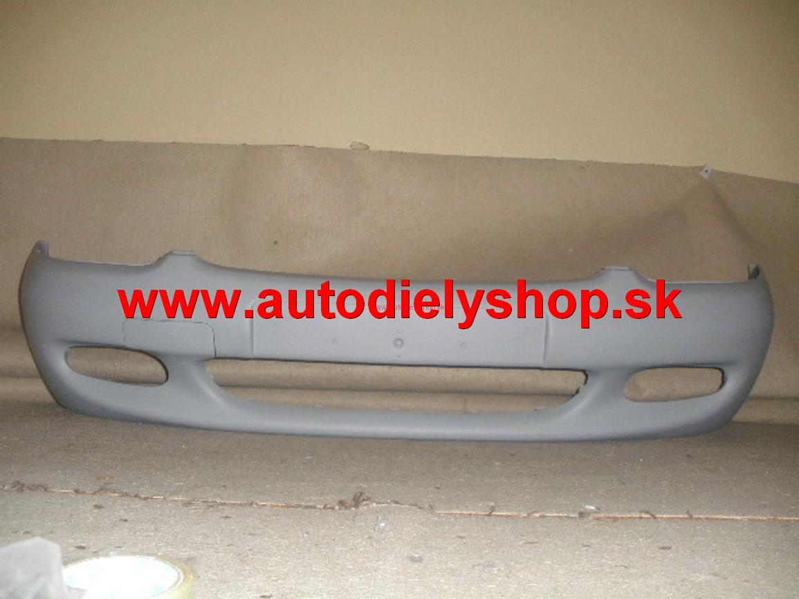 Ford Escort 95- predný nárazník s otvormi na hmlovky