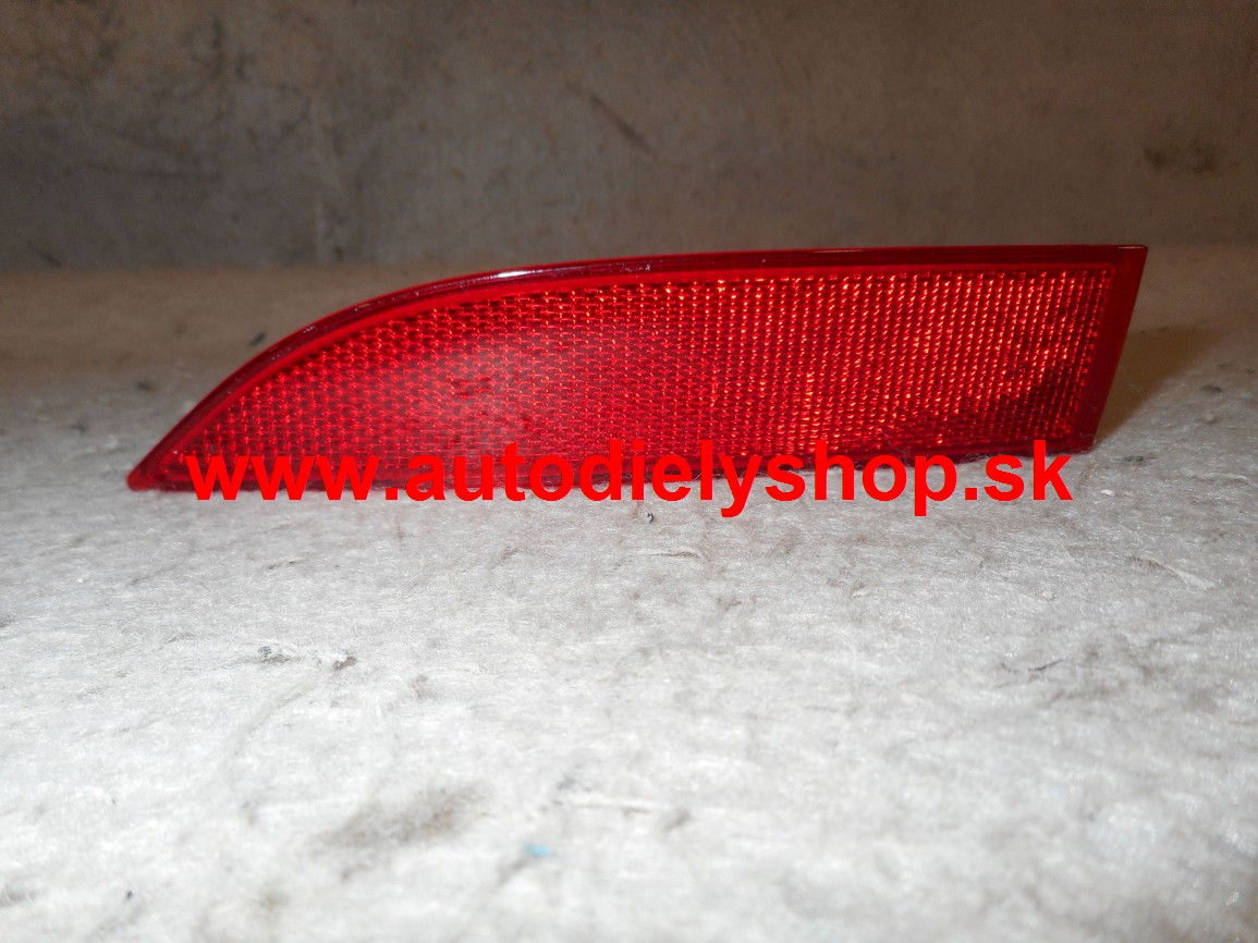 Dacia SANDERO 2012-  zadná odrazka v nárazníku, ľavá