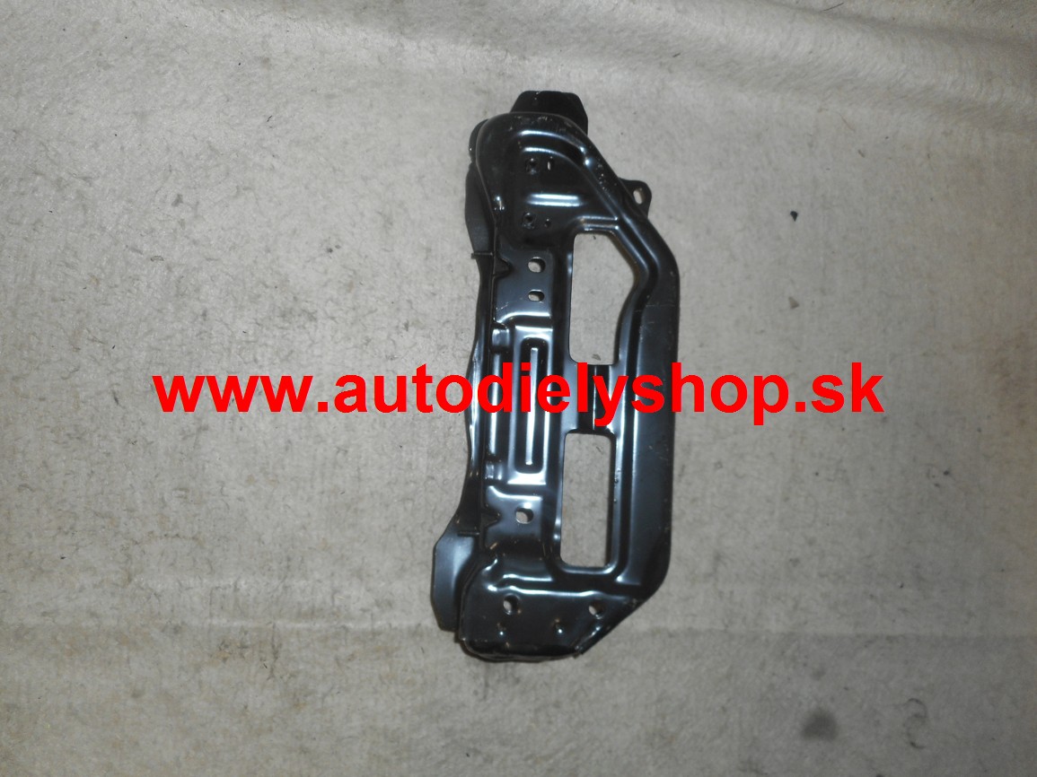 Toyota YARIS 2/06-3/09 držiak predného svetla pravý 